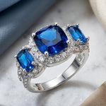 Sterling Silver Blue 3-Stone Halo CZ Ring