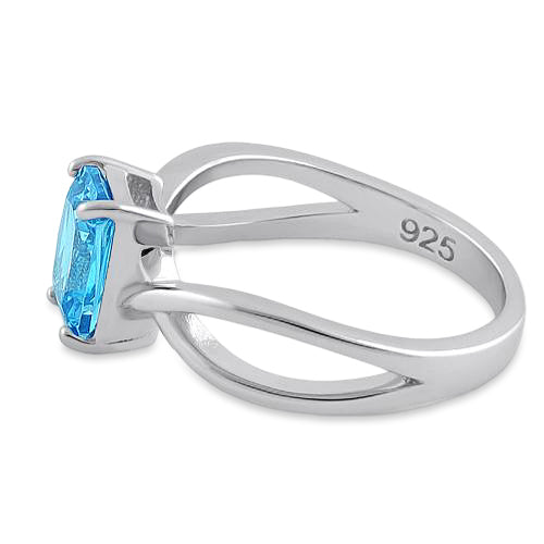 Sterling Silver Twist Emerald Cut Aqua Blue CZ Ring