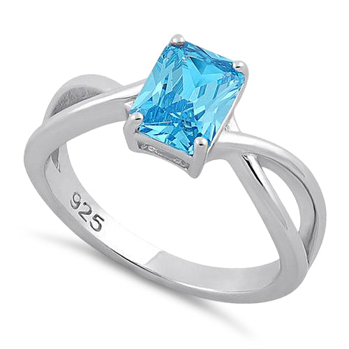 Sterling Silver Twist Emerald Cut Aqua Blue CZ Ring