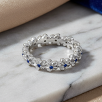 Sterling Silver Plumeria Blue Spinel CZ Eternity Band Ring