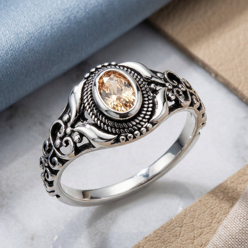 Sterling Silver Austere Oval Cut Champagne CZ Ring