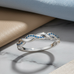 Sterling Silver Braided Aqua Blue CZ Ring