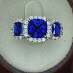 Sterling Silver Blue 3-Stone Halo CZ Ring