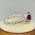 Sterling Silver Swirl Design Garnet and Clear CZ Ring