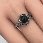 Sterling Silver Round Black Onyx Marcasite Halo Twist Ring