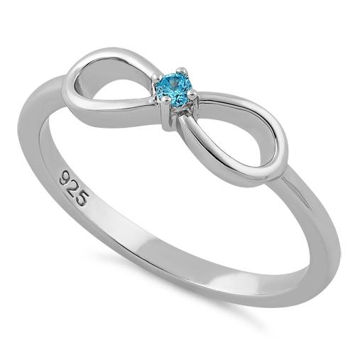 Sterling Silver Infinity Ribbon Aqua Blue CZ Ring