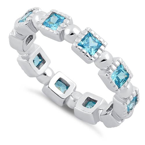 Sterling Silver Princess Cut Blue Topaz Eternity CZ Ring