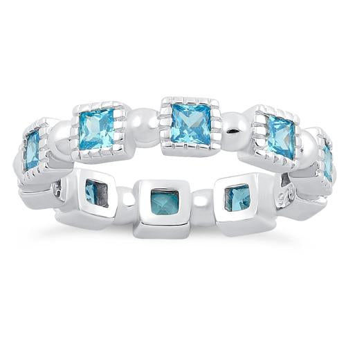 Sterling Silver Princess Cut Blue Topaz Eternity CZ Ring